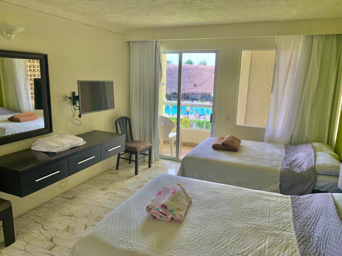 Apartamento Ocean View Aquamarina Cancún Exterior foto
